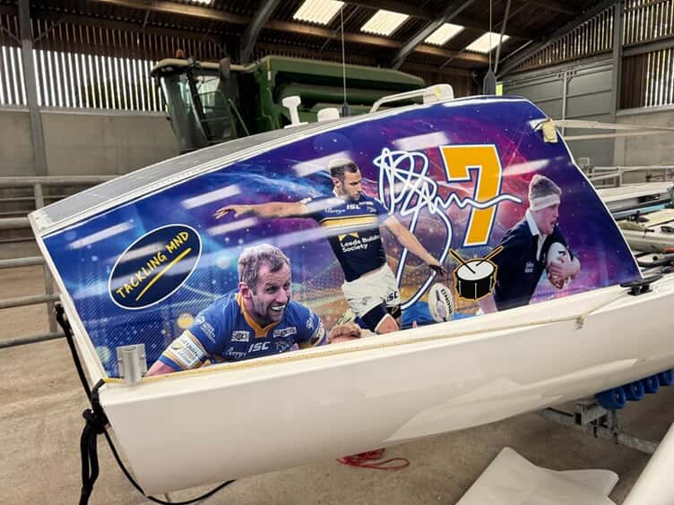 An image of the colorful wrap on the side of the boat.